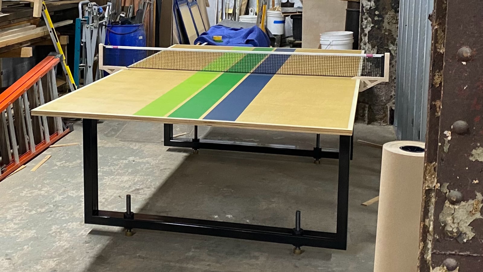 Finished table, bare birch on either side of the stripes