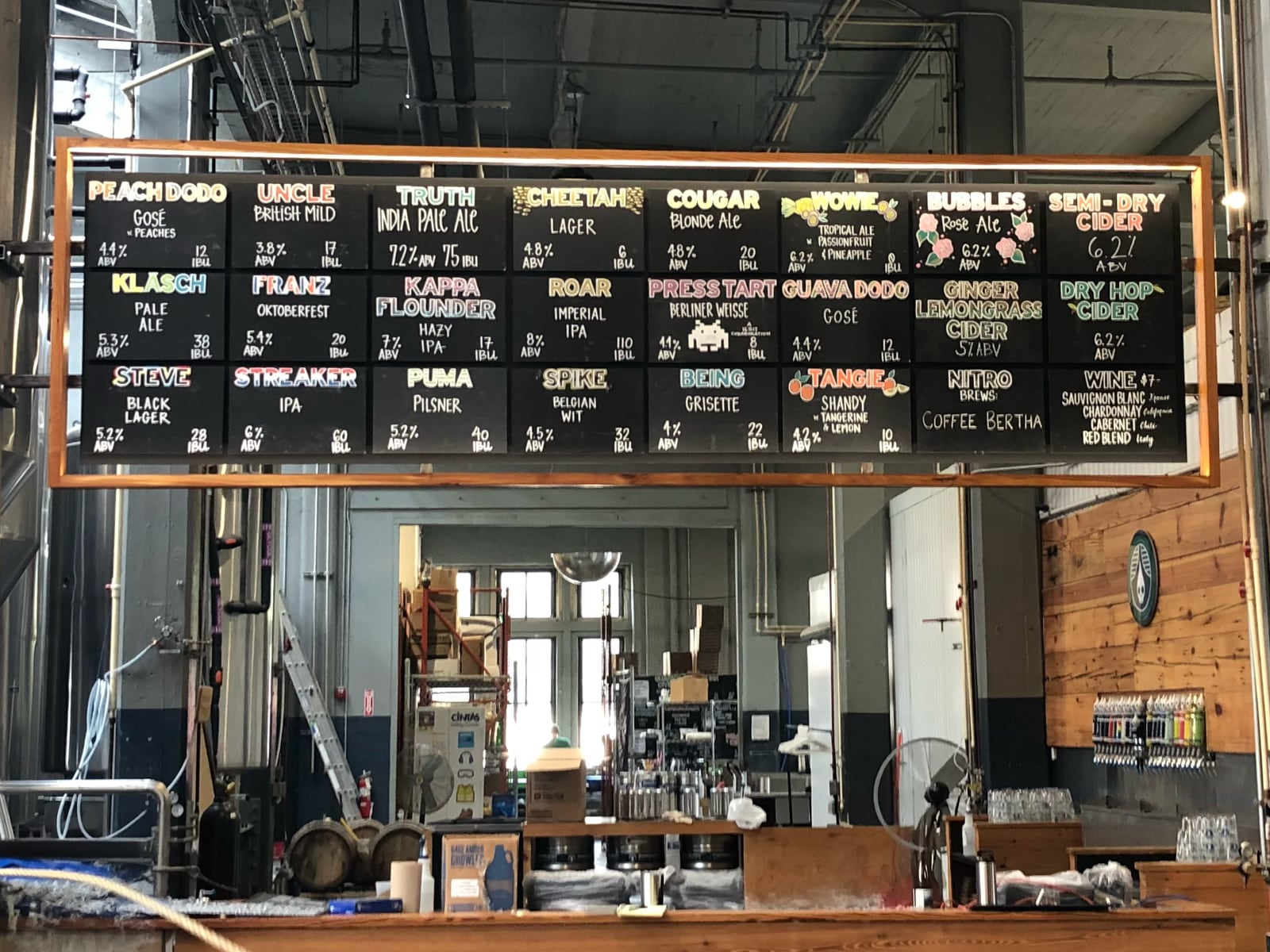 17-foot illuminated signboard over the auxiliary bar