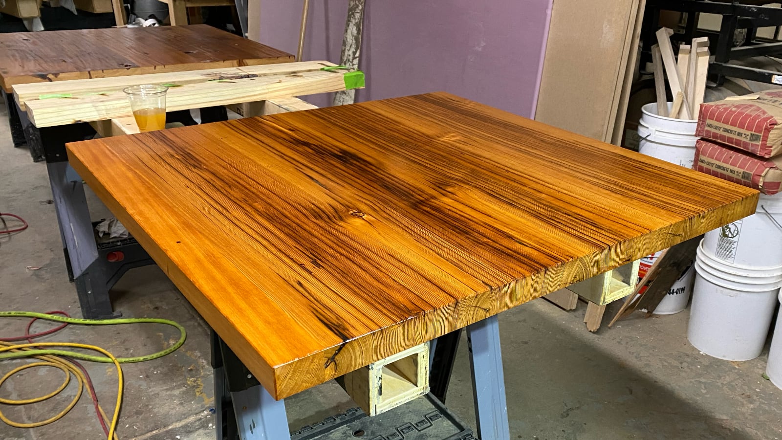 Reclaimed lumber four-top tables
