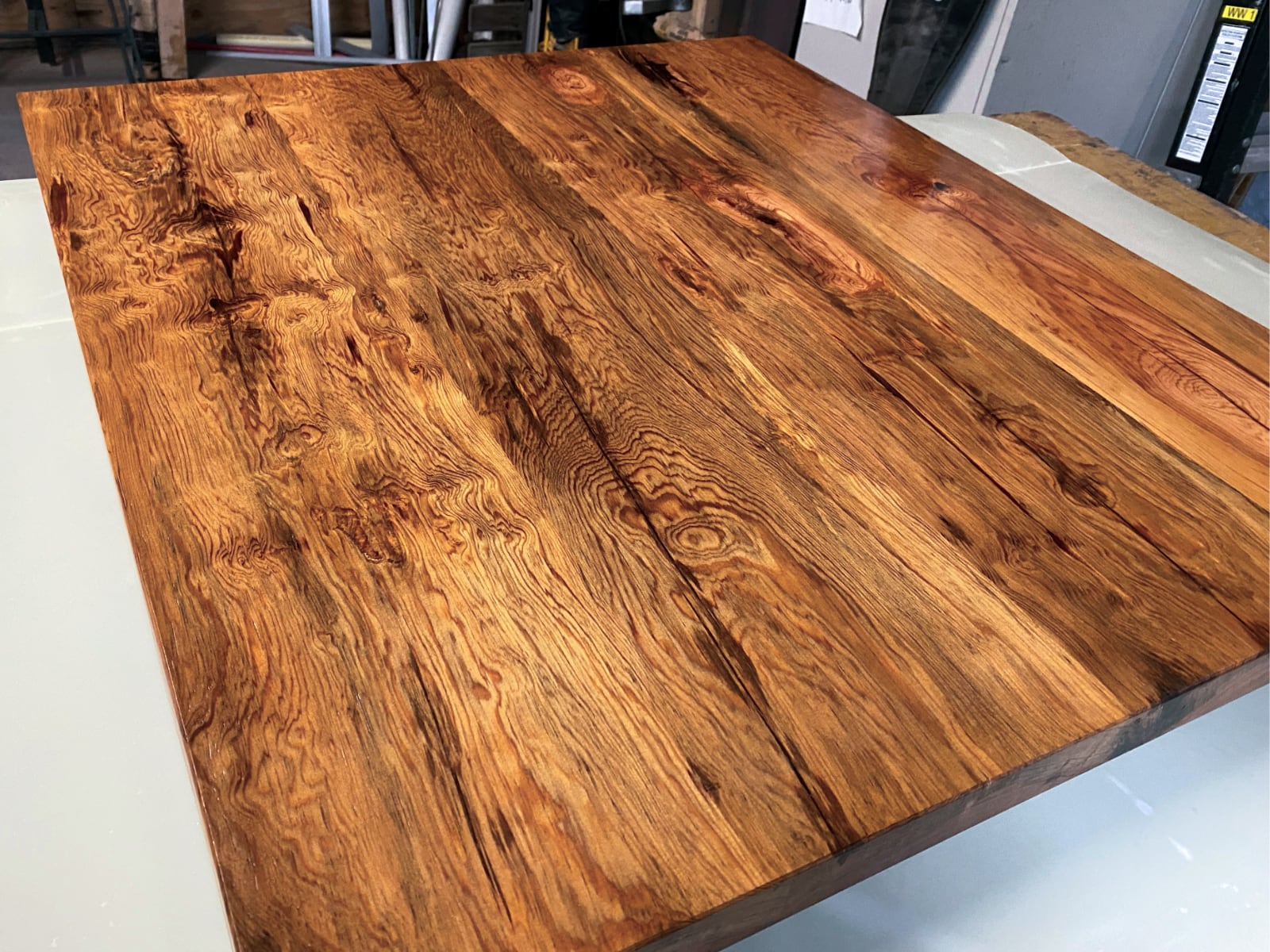 Striking grain pattern on a reclaimed lumber two-top
